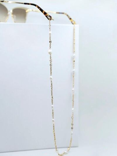 The exclusive Swarovski crystal and freshwater pearl glasses chain by Chloe. Courtesy Chloe