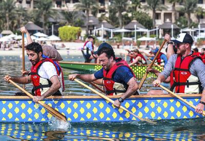 Dubai, U.A.E., November 17, 2018.  
A team building and rowing training + race for Dubai government employees.  The training will be held by Latitude 35 ��� who have achieved a combined eight Guinness World Records, across three oceans, and four continents. --The Dubai Rowers during the final race of the day.
Victor Besa / The National
Section:  NA
Reporter:  Haneen Dajani