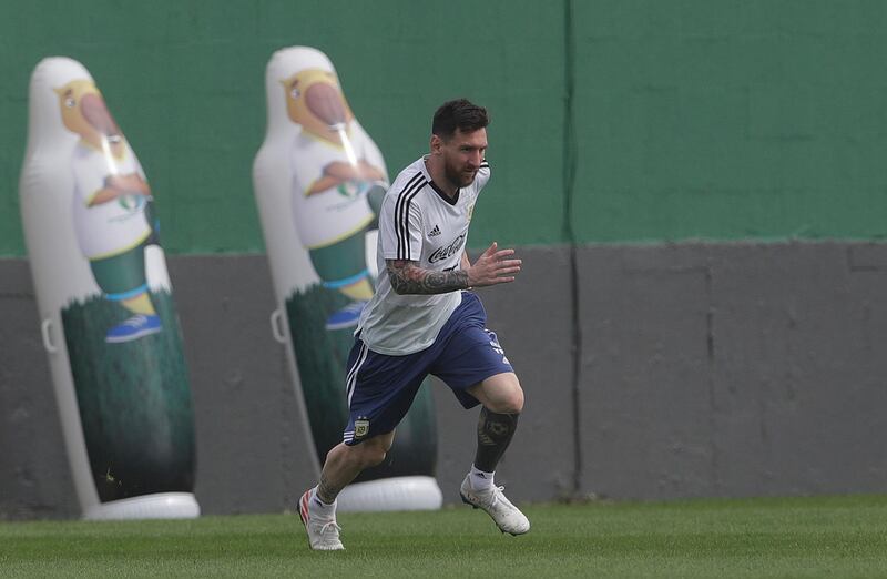 Messi puts in a sprint. AP Photo