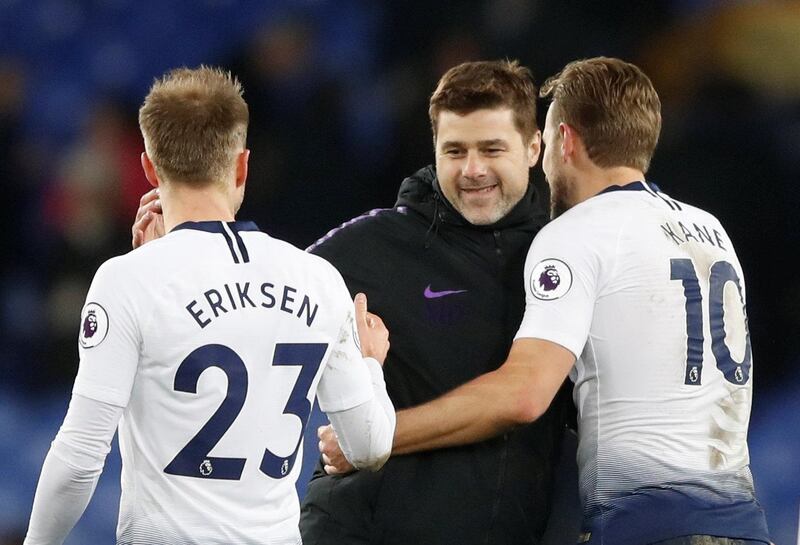 Soccer Football - Premier League - Everton v Tottenham Hotspur - Goodison Park, Liverpool, Britain - December 23, 2018  Tottenham's Christian Eriksen and Harry Kane celebrate with manager Mauricio Pochettino after the match    Action Images via Reuters/Carl Recine  EDITORIAL USE ONLY. No use with unauthorized audio, video, data, fixture lists, club/league logos or "live" services. Online in-match use limited to 75 images, no video emulation. No use in betting, games or single club/league/player publications.  Please contact your account representative for further details.