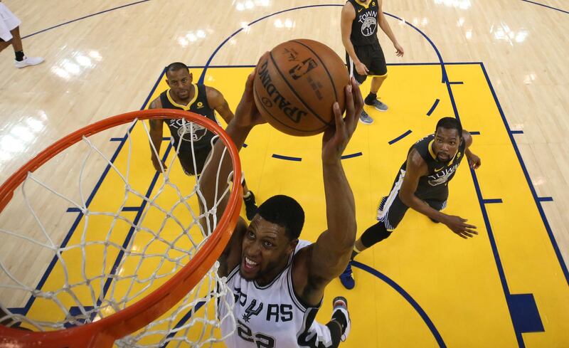 San Antonio Spurs forward Rudy Gay dunks the ball against the Golden State Warriors. Ezra Shaw / EPA