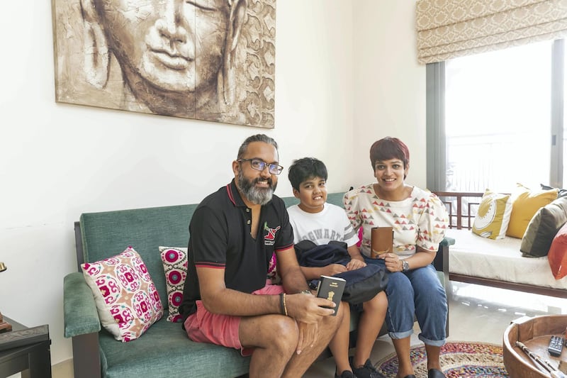 Mother Sneha May Francis, father Markos Abraham and son Rafael Francis Abraham. Dubai family reunited with passports and other belongings two years after they were stolen in Milan, Italy. May 20th, 2021. 
Antonie Robertson / The National.
Reporter: Mohamed Suleman for National.