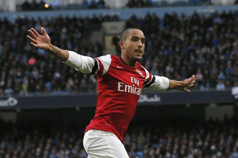 Right midfield: Theo Walcott, Arsenal. His side lost 6-3, but the 24 year old scored twice for Arsenal at Etihad Stadium. Phil Noble / Reuters