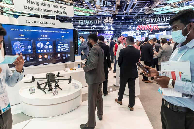 Visitors admire a drone on the third day of Gitex 2021.













.