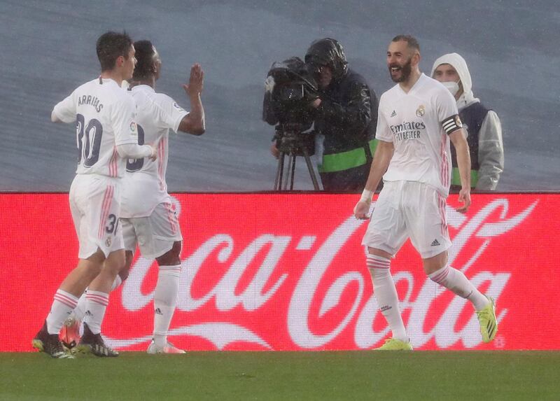 Real Madrid's French forward Karim Benzema celebrates with teammates. EPA