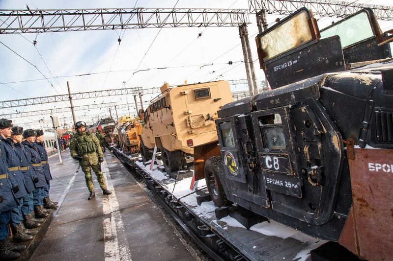 Russian soldiers stand next to a U.S. made armored personnel carrier. AP Photo