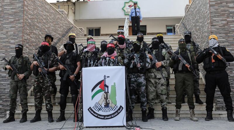 Fighters of various resistance factions take part in a press conference of the Joint Chamber of the Palestinian Resistance Factions in Gaza City.  EPA