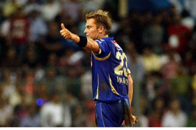 Shane Warne signals his approval on a career. The Australian great, who underwhelmed on his debut with Australia in 1992, finished one for 30 for Rajasthan. ‘Shane is a true champion,’ said Sachin Tendulkar.