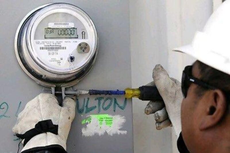 Smart energy schemes, including household meters like the one shown here, are just one part of the sustainable energy comeback. Pat Sullivan / AP