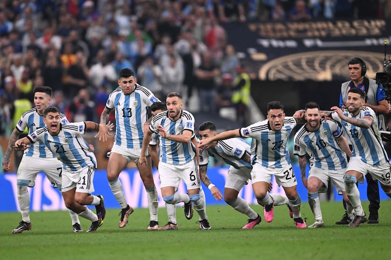 Argentina players celebrate winning the World Cup following one of the most dramatic finals in the tournament's history. AFP