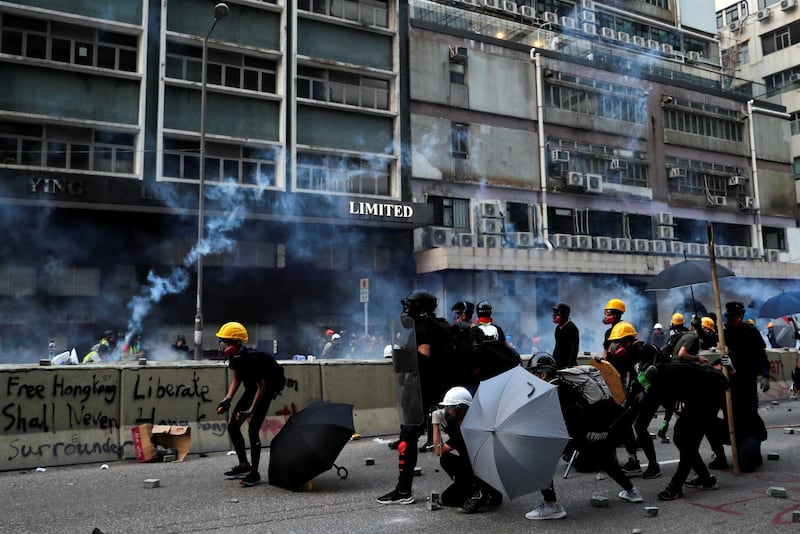 Demonstrators clash with riot police during a protest in Hong Kong, China. Reuters