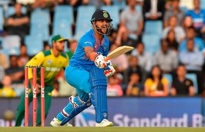 India's Suresh Raina shouts to the non-striking batsman during the second T20I cricket match between South Africa and India at Super Sport Park Stadium in Pretoria on February 21, 2018. / AFP PHOTO / Christiaan Kotze