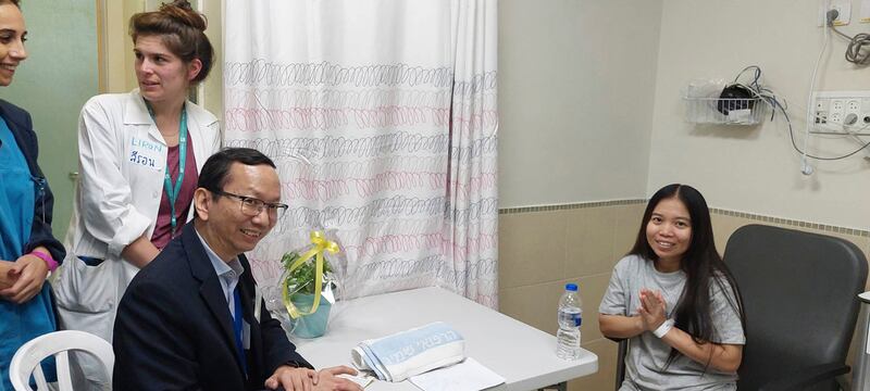 A Thai woman who was among the hostages released, before being taken to the Shamir Medical Centre in Israel. AP