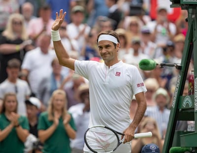 Jul 4, 2018; London, United Kingdom; Roger Federer (SUI) celebrates match point during his match against Lukas Lacko (SVK) on day three at the All England Lawn and Croquet Club. Mandatory Credit: Susan Mullane-USA TODAY Sports