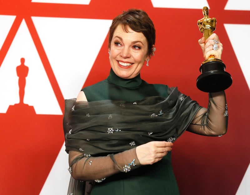 epa07395388 Olivia Colman holds her award for Actress in a Leading Role for 'The Favourite;' as she poses in the press room during the 91st annual Academy Awards ceremony at the Dolby Theatre in Hollywood, California, USA, 24 February 2019. Green dress by Prada, jewels by Chopard. The Oscars are presented for outstanding individual or collective efforts in 24 categories in filmmaking.  EPA-EFE/ETIENNE LAURENT
