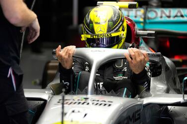 Mercedes' British driver Lewis Hamilton gets out of his car during the qualifying session at the Circuit de Catalunya on May 21, 2022 in Montmelo, on the outskirts of Barcelona, ahead of the Spanish Formula One Grand Prix.  (Photo by Manu Fernandez  /  POOL  /  AFP)