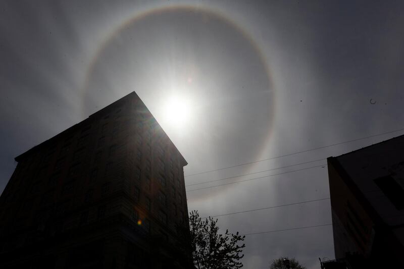 A sun halo is seen silhouetting the First National Bank Building in downtown Vicksburg, Mississippi. AP