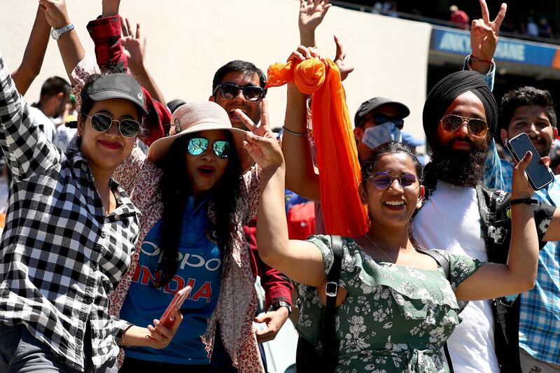 Fans celebrate India winning the second Test in Melbourne. Getty