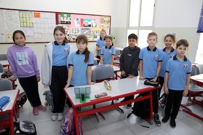 The private school follows the Russian federal curriculum and attracts children from 24 countries including Russia, Ukraine and Belarus. Pawan Singh / The National