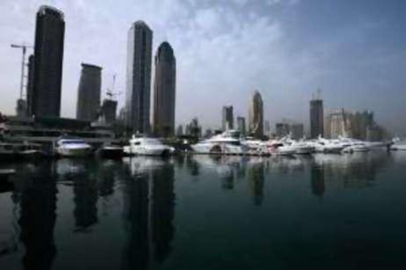 DUBAI-JUNE 24 ,2008 - Hotels and Commercial building reflects on the water in Dubai Marina that complete the skyline in Dubai. ( Paulo Vecina/The National )  *** Local Caption ***  PV skyline 4.JPGPV skyline 4.JPG