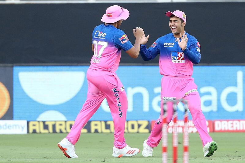 Robin Uthappa of Rajasthan Royals celebrates the wicket of Aaron Finch of Royal Challengers Bangalore with Riyan Parag of Rajasthan Royals during match 33 of season 13 of the Dream 11 Indian Premier League (IPL) between the Rajasthan Royals and the Royal Challengers Bangalore held at the Dubai International Cricket Stadium, Dubai in the United Arab Emirates on the 17th October 2020.  Photo by: Ron Gaunt  / Sportzpics for BCCI