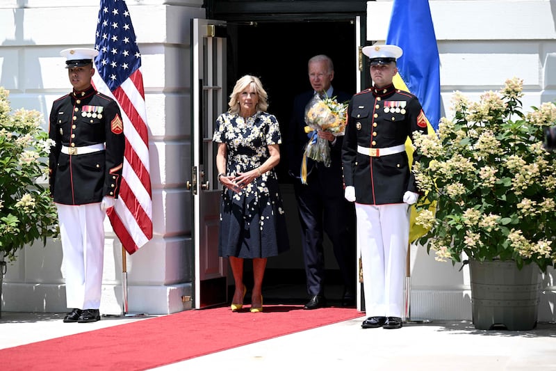US President Joe Biden and US first lady Jill Biden wait to welcome Ukrainian first lady Olena Zelenska to the White House in Washington. AFP