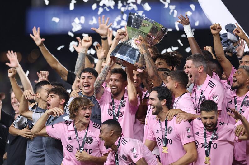 Lionel Messi and his Inter Miami teammates celebrate with the Leagues Cup trophy. Getty