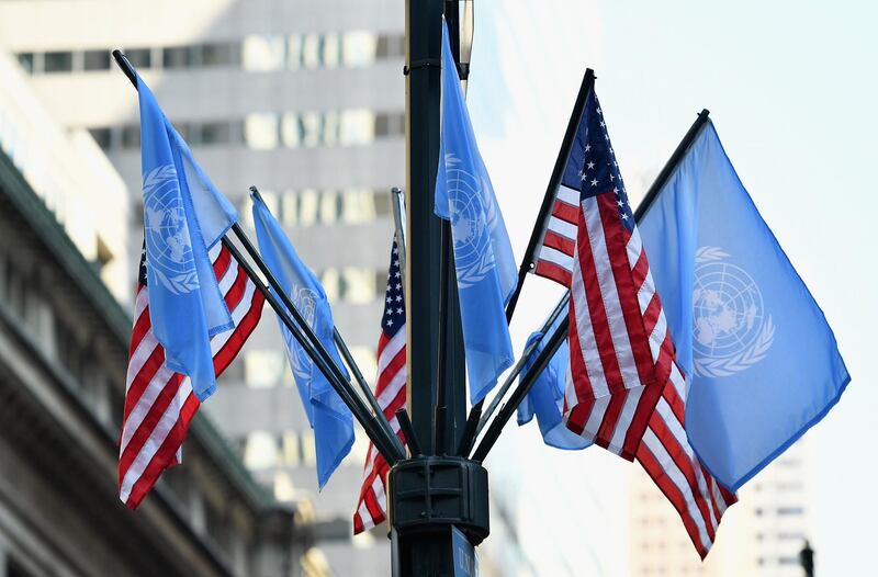 (FILES) In this file photo taken on September 23, 2019 flags of the United Nations and the United States of America are seen in New York City. Germany and Estonia plan to submit a resolution to the UN Security Council on a global ceasefire during the coronavirus pandemic, to replace one drafted by France and Tunisia that the United States has blocked, diplomatic sources said May 12, 2020.   / AFP / Angela Weiss
