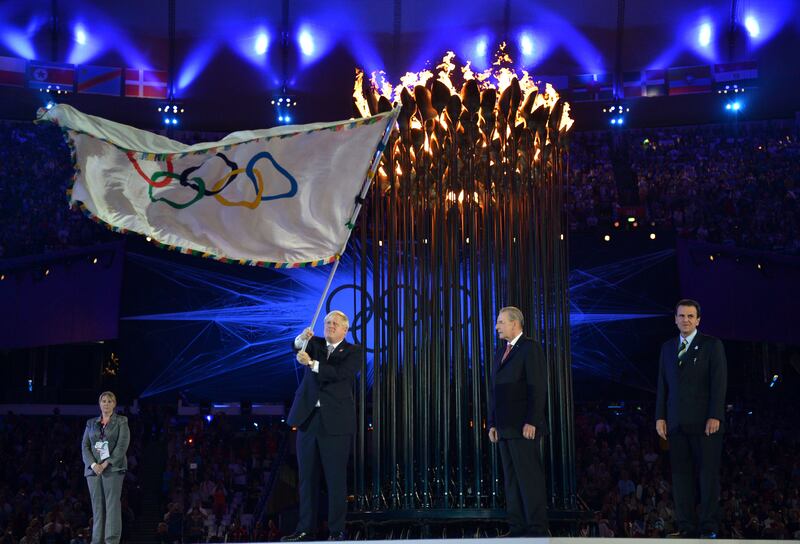 The Olympic Flag is passed from Mr Johnson to IOC President Jacques Rogge during the closing ceremony of the London 2012 Olympic Games. Getty Images