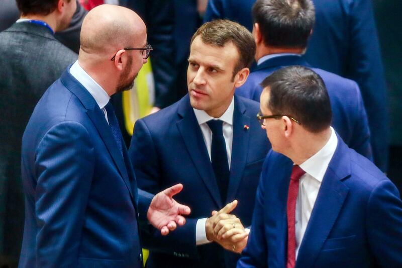 French President Emmanuel Macron with Belgian Prime Minister Charles Michel, left.  AP