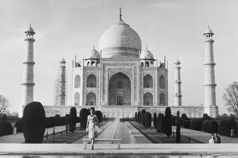 (Original Caption) Mrs. Jacqueline Kennedy stands in front of the Taj Mahal here, during her semiofficial visit to India and other Asian points.