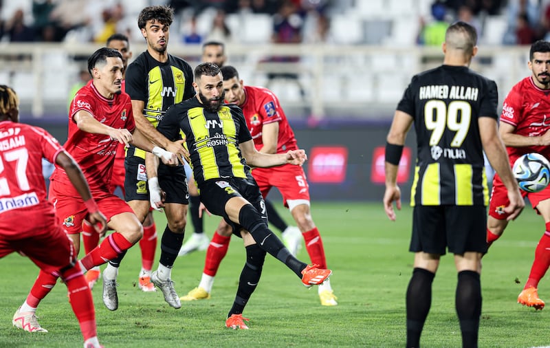 Karim Benzema of Al Ittihad scores the opening goal against Al Wehda in their 2-1 victory in the Saudi Super Cup semi-final  at Al Nahyan Stadium in Abu Dhabi on Monday, April 8, 2024. EPA