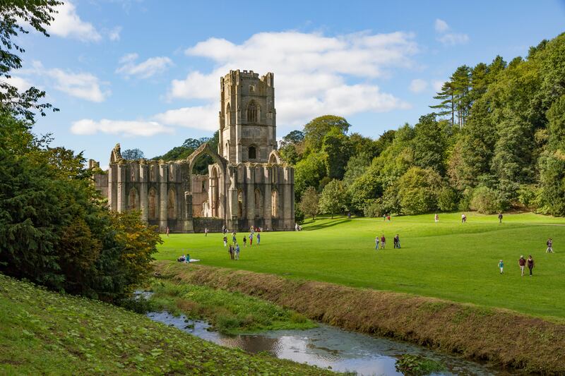 Studley Royal Park including the Ruins of Fountains Abbey in Yorkshire, England.