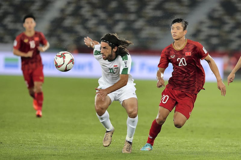 ABU DHABI , UNITED ARAB EMIRATES , January 8 – 2019 :- Humam Tareq Faraj ( no 11 in white ) of Iraq in action during the AFC Asian Cup UAE 2019 football match between IRAQ vs. VIETNAM held at Zayed Sports City in Abu Dhabi. Iraq won the match by 3-2. ( Pawan Singh / The National ) For News/Sports