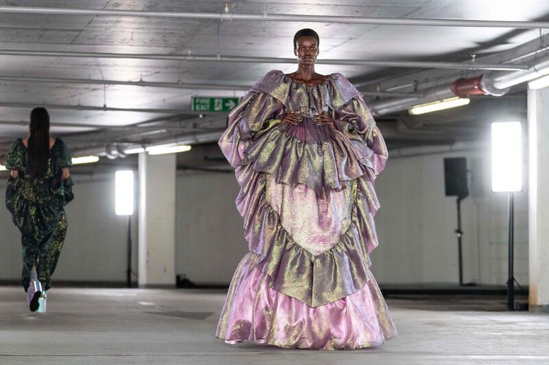 Edward Crutchley's show ended with a gown in vert de gris and seashell pink.  AFP