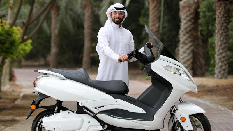 Mohamed Al Abd with Solva Technologies' electric bike. Chris Whiteoak / The National