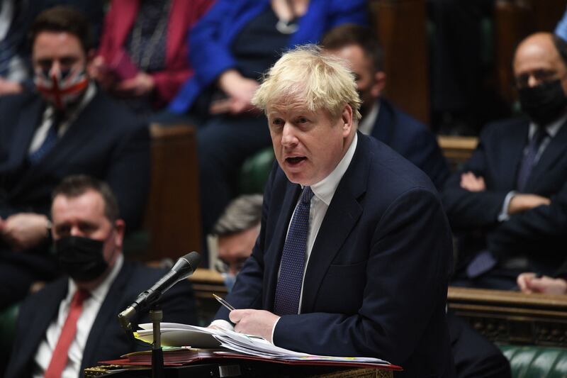 British Prime Minister Boris Johnson addresses the House of Commons in London on January 5. AFP