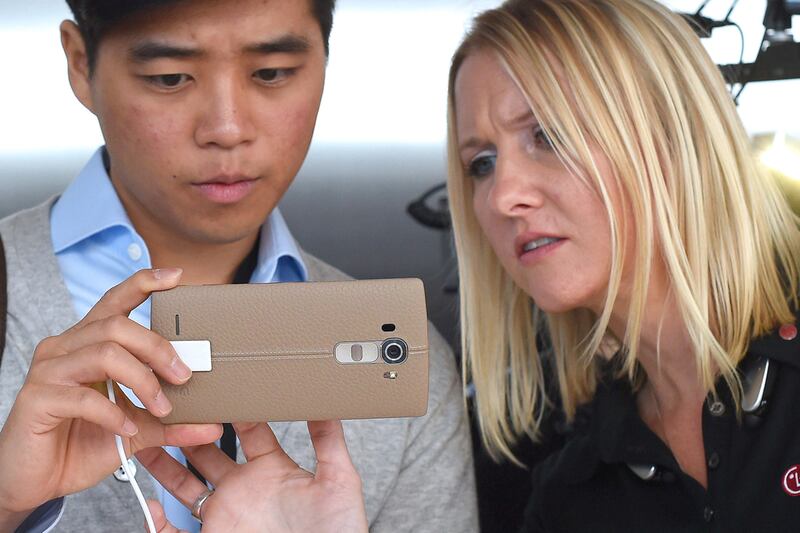 Media get to look at the new LG G4 phone. Timothy Clary / AFP