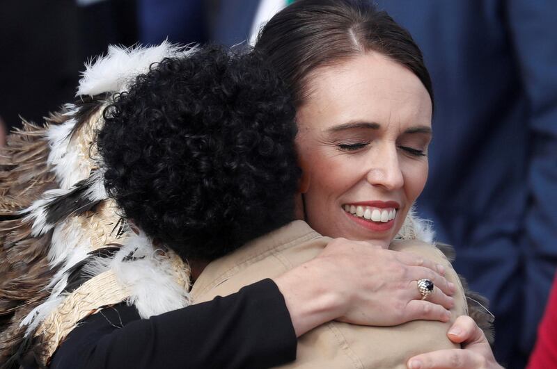 New Zealand's Prime Minister Jacinda Ardern hugs a victim's relative during the national remembrance service for victims of the mosque attacks, at Hagley Park in Christchurch, New Zealand. Reuters