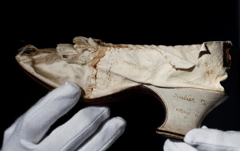 The shoe is in good condition apart from slight wear of the silk. Reuters