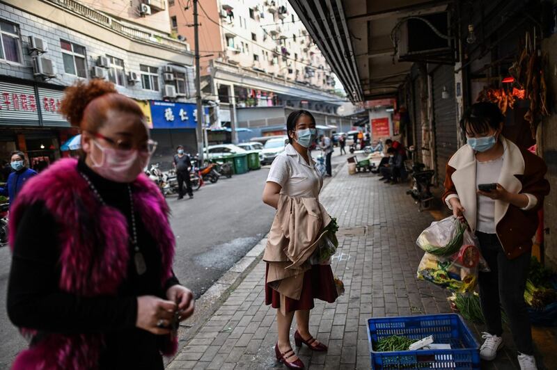 A roadside food stall in Wuhan in China's central Hubei province on April 8, 2020, as travel restrictions to halt the spread of the COVID-19 coronavirus were lifted in the city. AFP