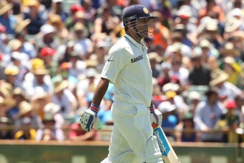 Indian captain MS Dhoni loses his wicket to Australian fast bowler Peter Siddle and Australia won the third cricket Test match by an innings and 37 runs in the Border-Gavaskar Trophy Series at the WACA ground in Perth on January 15 2012. IMAGE STRICTLY RESTRICTED TO EDITORIAL USE-STRICTLY NO COMMERCIAL USE AFP PHOTO/Tony ASHBY

