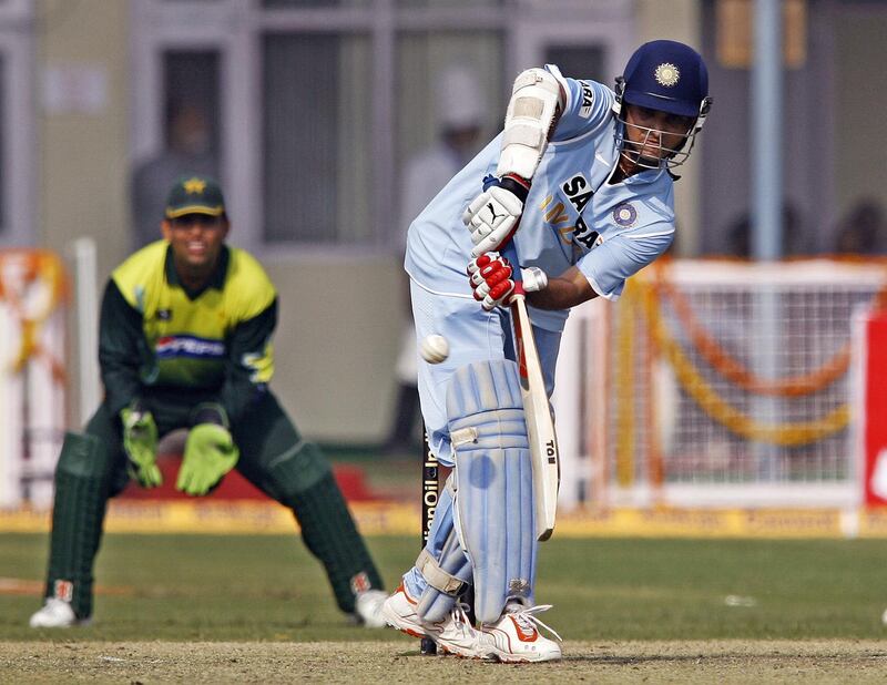 India cricketer Saurav Ganguly plays a shot during the third One-day International (ODI) match against Pakistan at the Green Park Stadium in Kanpur, 11 November 2007.  Pakistan captain Shoaib Malik won the toss and sent India in to bat in the third one-day international at the Green Park as the five-match series is tied at 1-1.        AFP PHOTO/ Prakash SINGH (Photo by PRAKASH SINGH / AFP)
