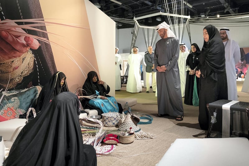 ABU DHABI, UNITED ARAB EMIRATES - December 05, 2018: HH Sheikh Mohamed bin Zayed Al Nahyan, Crown Prince of Abu Dhabi and Deputy Supreme Commander of the UAE Armed Forces (centre R), visits the House of Artisans at the Qasr Al Hosn Festival.
( Ryan Carter / Ministry of Presidential Affairs )
---