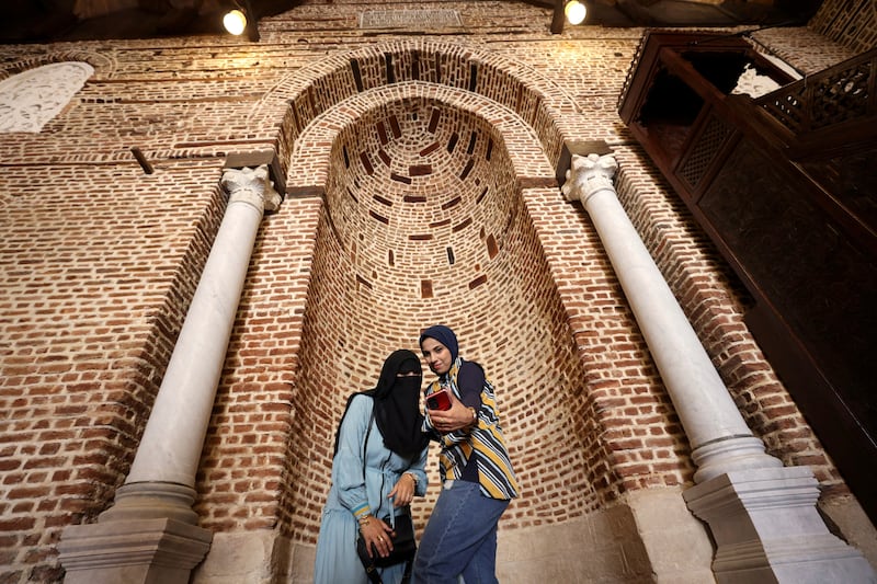 Women take selfies inside Al Zahir Baybars Mosque in Cairo after it was reopened following renovations. The mosque was built in 1268. Reuters
