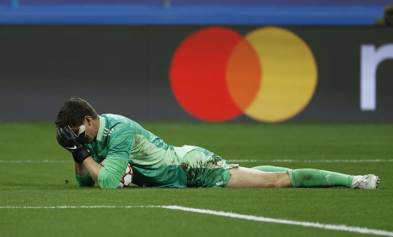 REAL MADRID RATINGS: Thibaut Courtois 7. Couldn’t be blamed for Chelsea’s first goal. Or the second, both towering headers. Unlucky on the third. Fine save from a powerful Ziyech shot on 114 minutes. 
EPA