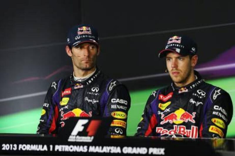 The celebrations between Red Bull Racing teammates Mark Webber, left, and Sebastian Vettel, were muted after the Malaysian Grand Prix after the latter ignored team orders to pass Webber.