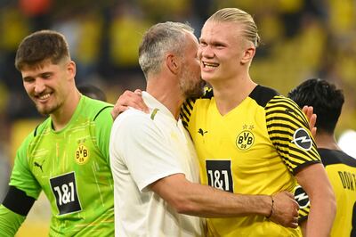 Dortmund's forward Erling Braut Haaland with coach Marco Rose after the match against Eintracht Frankfurt. AFP