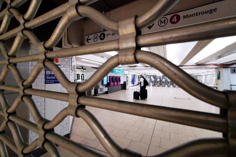 Closed metro gates at the Gare du Nord station during a strike by Paris transport network workers to demand pay rises in February 2022. Reuters