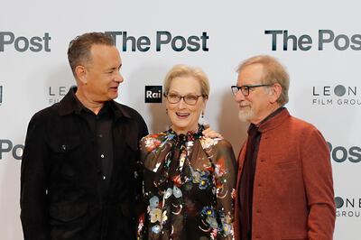 Actors Tom Hanks, from left, Meryl Streep and director Steven Spielberg pose for photographers during a photo call for the film 'The Post' in Milan, Italy, Monday, Jan.15, 2018. (AP Photo/Antonio Calanni)